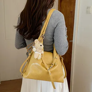 Mochila tote de hombro casual de gran capacidad para mujer, elegante bolso multifuncional.