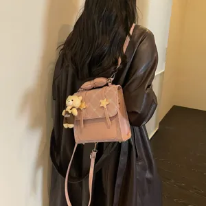 Zaino piccolo rosa da donna, elegante borsa a tracolla coreana con ciondolo a orsetto.