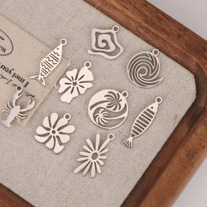 Stainless steel ocean theme charms set, hollow fish and flower DIY jewelry pendants.