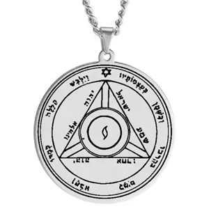 Detailed close-up of stainless steel Solomon seal talisman pendant with occult Hebrew script.