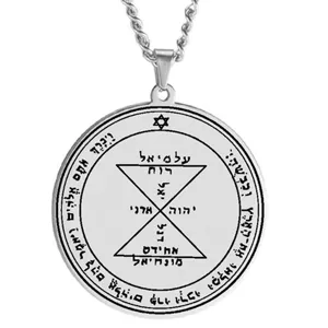 Close-up detail of stainless steel Solomon seal amulet pendant with engraved mystical Hebrew symbols.