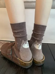 Brown cotton mid-tube socks for women featuring cute flocked cat heel design, soft daily wear.