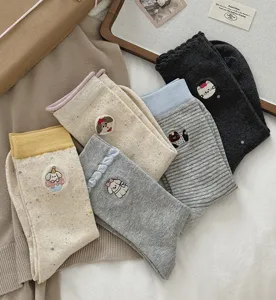 Cute cartoon animal embroidered mid-tube socks detail, retro flecked yarn design, cozy warm.