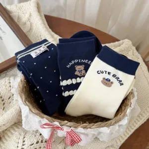 Japanese navy cartoon bear slouch socks for women, cute preppy style mid-tube socks.