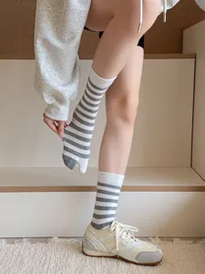 Japanese style striped tabi socks for women, split toe design, soft and comfortable cotton.