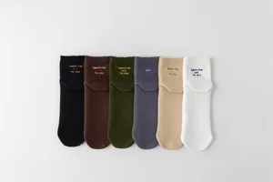 Men's cotton socks with stylish embroidered letters, crew socks in 6 colors for daily wear.