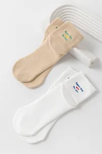 Comfortable cotton mid-calf socks with cute embroidery, casual style daily wear pair.