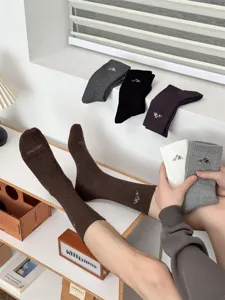 Men's casual mid-calf cotton socks with stylish mountain embroidery and comfortable fit for daily wear.