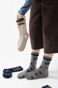 Original cartoon design women's mid-tube cotton socks with cute animal illustrations and spots.