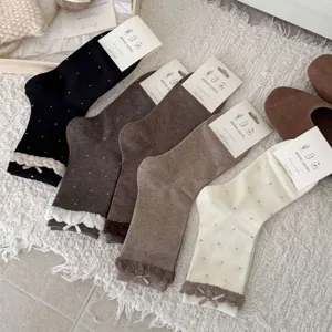 Japanese sweet polka dot mid-calf socks with lace ruffle and cute bow for daily women.