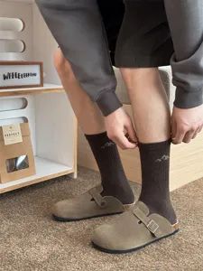 Men's stylish mid-tube cotton socks with mountain embroidery, perfect for street fashion wear.