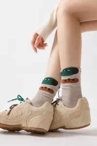 Cotton mid-calf socks with cute cartoon design, artistic illustration, comfortable daily wear.