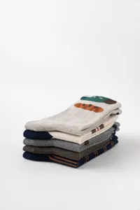 Stack of cute cartoon design women socks artistic cotton mid tube socks detail view