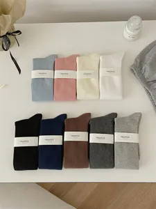 Women solid color ribbed mid-calf socks set, soft cotton casual long stack socks for autumn winter.