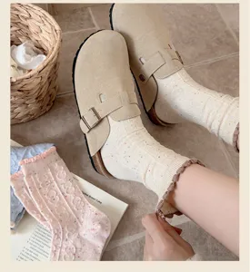 Korean style cable knit ruffle mid-tube socks paired with cozy suede mule shoes for autumn.