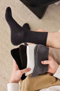 Men's classic ribbed crew socks in assorted colors, breathable cotton, detailed view.
