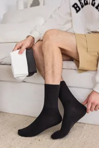 Men's classic mid-tube cotton socks, breathable and sweat-absorbent, ideal for casual and business wear.