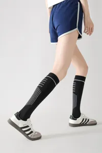 Calze a compressione polpaccio donna corsa fitness traspiranti rigate lunghe sportive