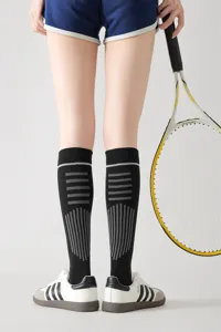 Calze sportive a compressione da donna lunghe rigate fitness corsa ginocchio alte.
