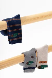 Detailed shot of creative cartoon design women's mid-calf cotton socks with cute patterns.