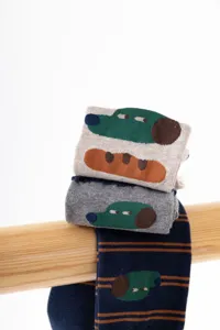 Charming cartoon dog pattern mid-tube cotton socks, artistic design, comfortable fit for daily wear.