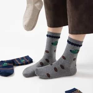 Cute cartoon design women mid-tube socks with polka dots and creative fun style for daily wear.