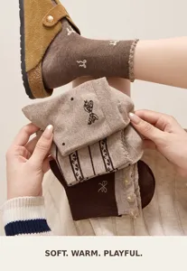 Calze a metà gamba marroni vintage da donna con fiocchi carini e motivi a pois.