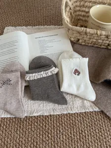 Sweet girl cotton socks with lace ruffles and cute embroidery, perfect for daily cute outfits.