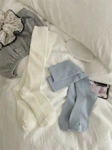 Women Japanese style ribbed long socks, autumn winter solid color cotton knee high socks detail.