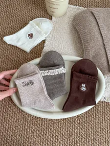 Sweet Japanese style embroidered mid-tube cotton socks detail view with cute patterns