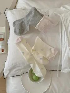 Cute women's cotton socks with sweet pearl lace ruffles and bow embroidery, cozy daily wear style.