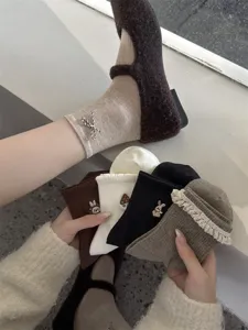 Sweet cotton mid-calf socks detailed with cute embroidered rabbit, mushroom and delicate lace.