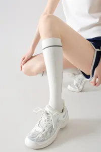 Calze a compressione sportiva da donna, calze alte a righe per corsa, fitness e palestra.