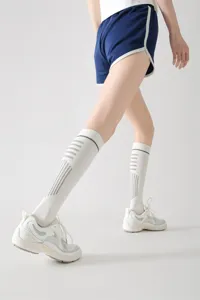 Calze sportive a compressione per polpaccio da donna traspiranti corsa fitness a righe alte