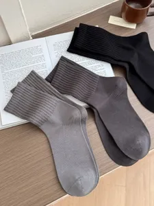 Classic men's cotton mid-tube socks detail view, breathable and comfortable solid color design.