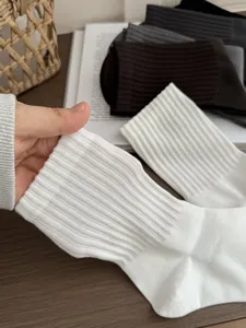 Close up view of breathable ribbed cotton men's socks showing soft texture and fine knit.