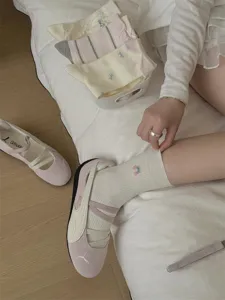 Korean style cute embroidered ruffle socks for women, off white cotton socks detail display.