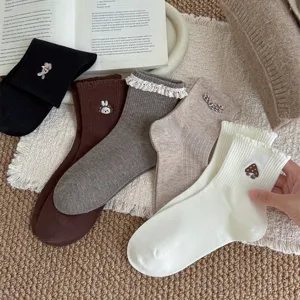 Sweet aesthetic cotton mid-tube socks with cute lace and delicate embroidery for daily wear.