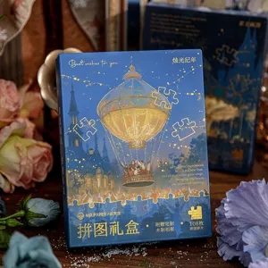 Vue détaillée du magnifique coffret puzzle de nuit MR.PAPER avec motif de montgolfière.