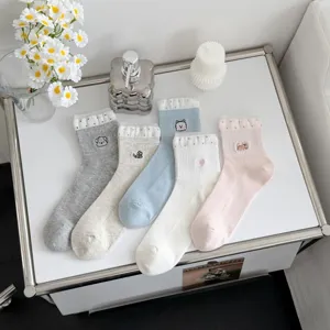 Cute mesh women mid-calf socks detail showing lovely animal embroidery and breathable summer fabric.