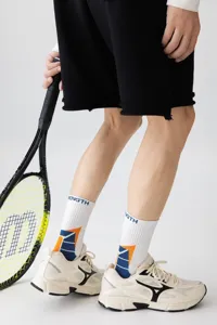 Calcetines deportivos de tubo medio para hombre con diseño color-block y estampado de letras.