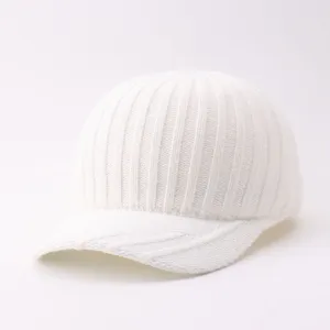 Close-up of the knitted texture and front brim details of the warm winter white baseball cap.