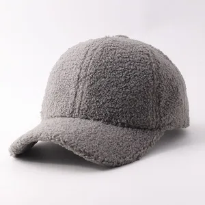Grey sherpa baseball cap detail, soft fleece texture and curved brim for cozy winter wear.