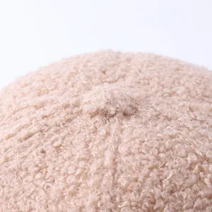Beige fleece warm winter hat detail shot, soft fluffy texture, comfortable stylish daily wear.