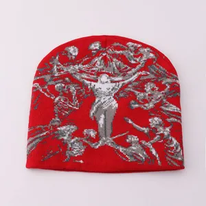 Red Y2K knitted beanie featuring intricate artistic human figure graphic pattern for streetwear.
