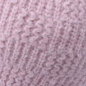 Vista de primer plano de la textura de tela tejida de la gorra, suave y muy cálida.