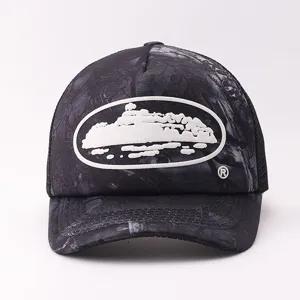 Stylish camouflage trucker hat with mesh back and unique cruise ship patch for summer wear.
