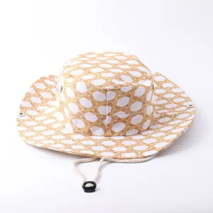 Detail view of the outdoor sun hat with woven pattern and chin strap for men and women.