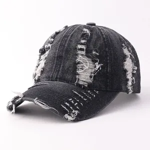 Black distressed denim baseball cap with frayed details, vintage curved brim casual hat.