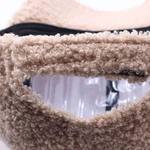 Close-up detail of winter warm fleece baseball hat, soft sherpa fabric texture, khaki color.